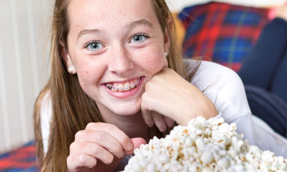 why cant you eat popcorn with braces
